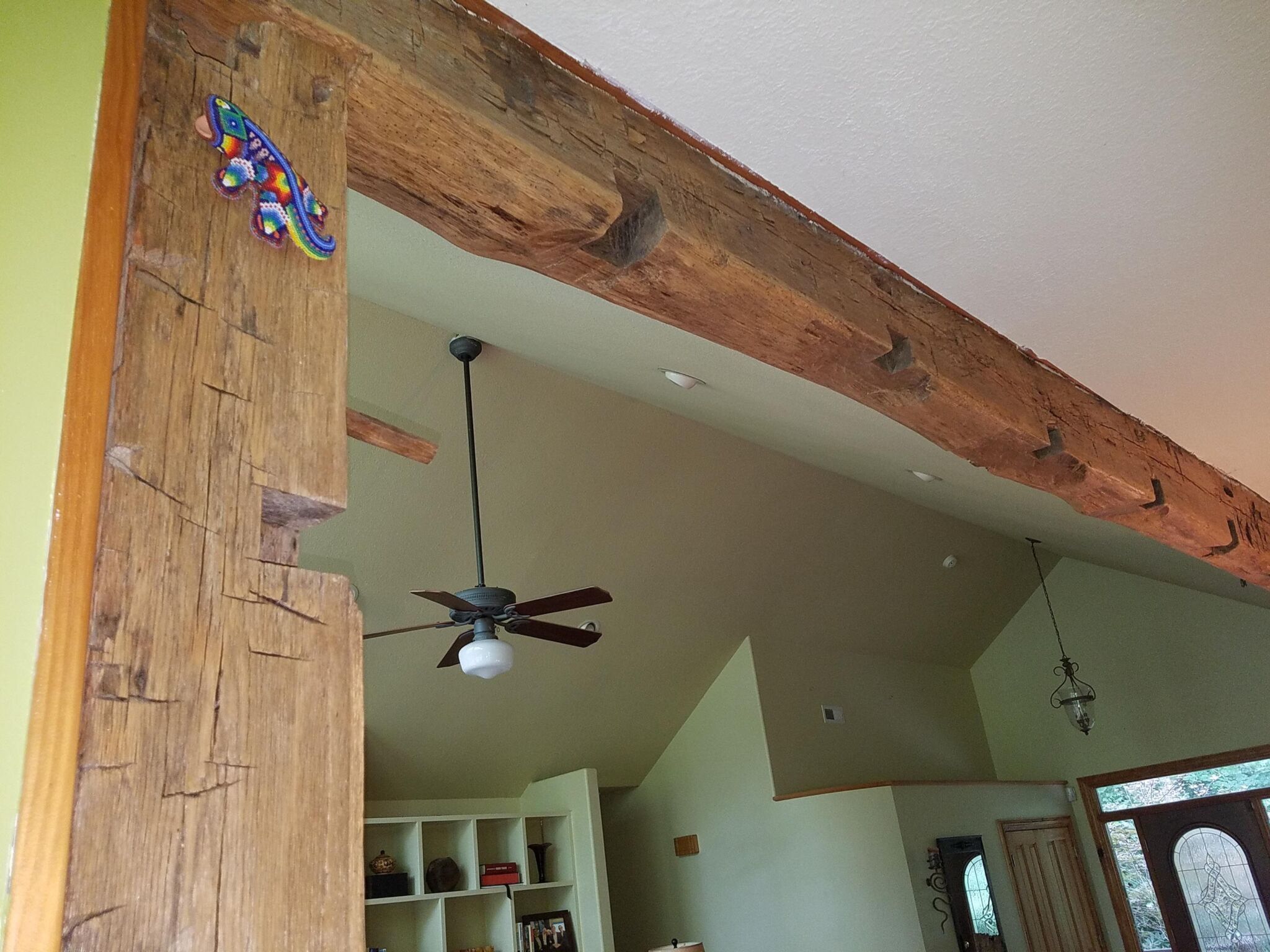 hand hewn door frame post w mortises close up
