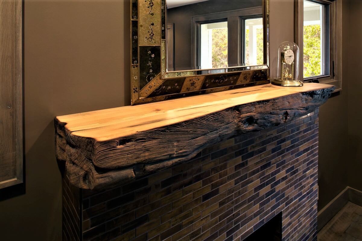 Charred heart pine mantel in Candler North Carolina home
