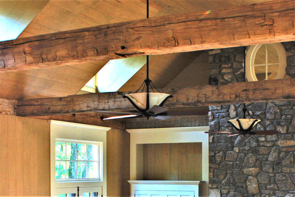 Hand hewn timbers in Hendersonville NC by whole log reclaimed