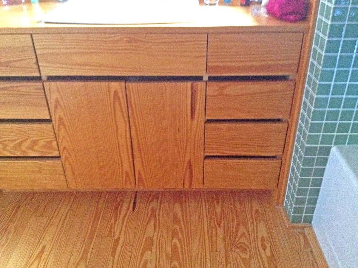 Heart Pine Vanity and floor in a bathroom, hendersonville, nc