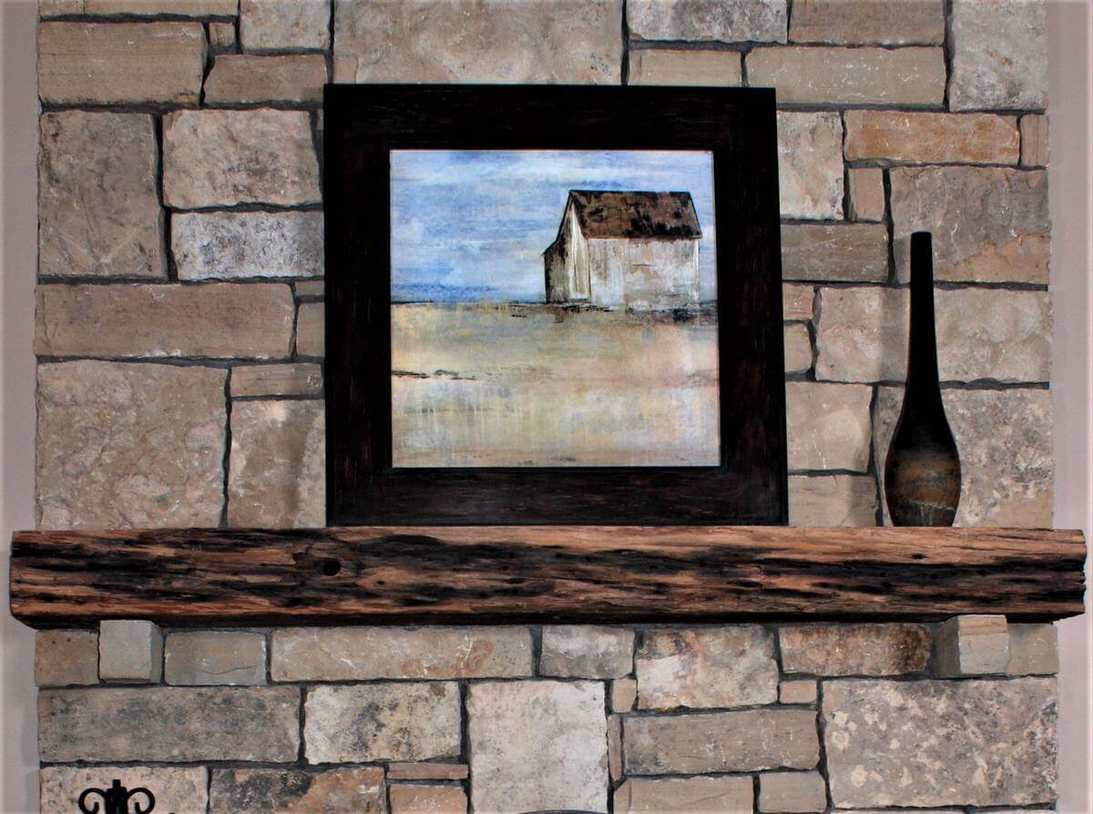 Lightly Charred Hardwood Mantel over a stone fireplace Unfinished