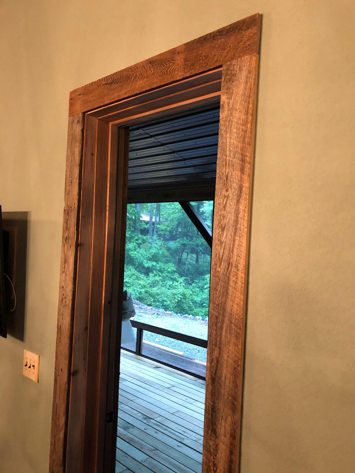 Original Surface Pine Casing around a door looking outside