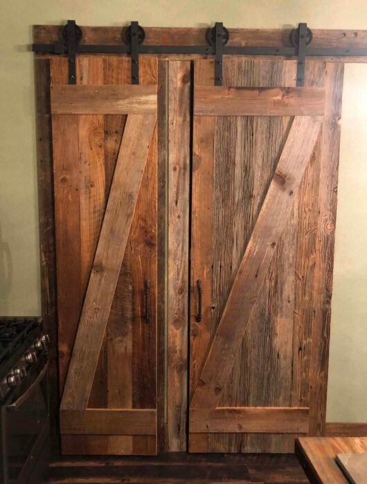 Reclaimed barn wood doors with original surface pine.