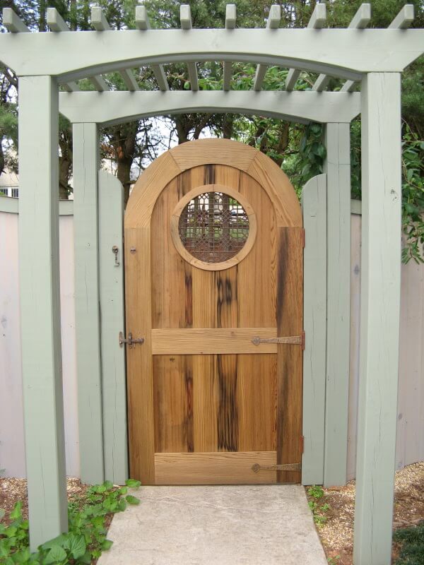 Antique cypress garden gate in a  weaverville nc home garden