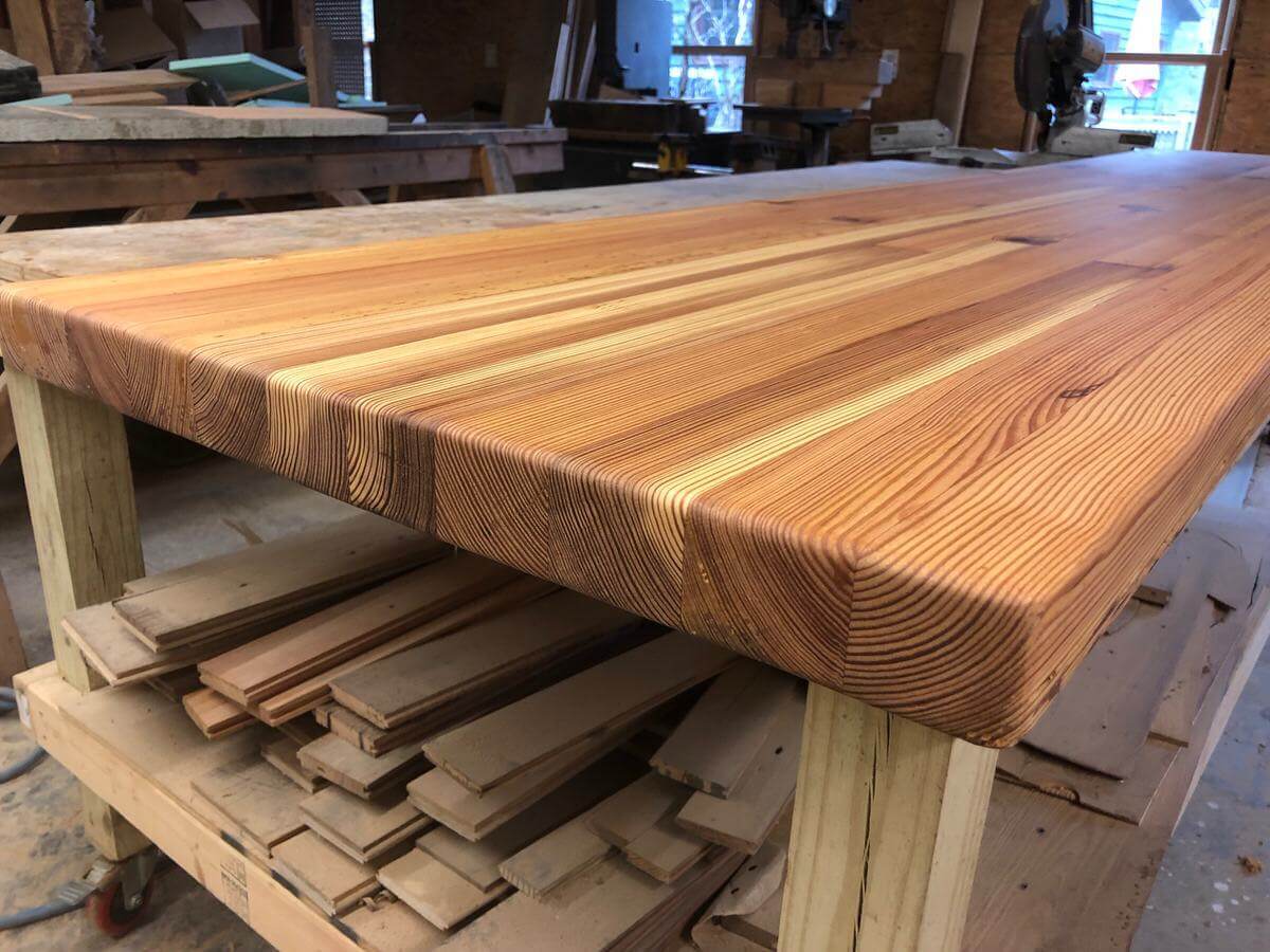 Antique heart pine butcher block counter top on production table