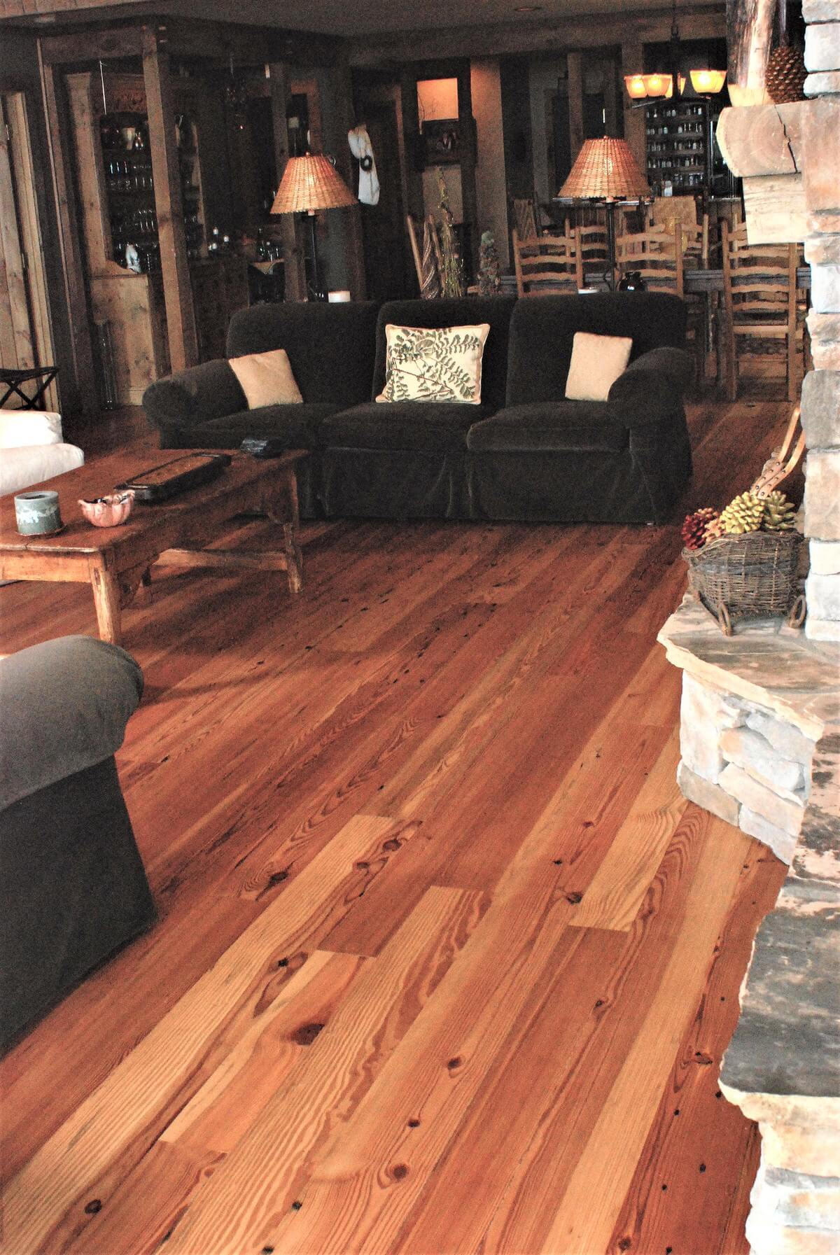 heart pine Cabin grade floor and a sofa in hendersonville nc