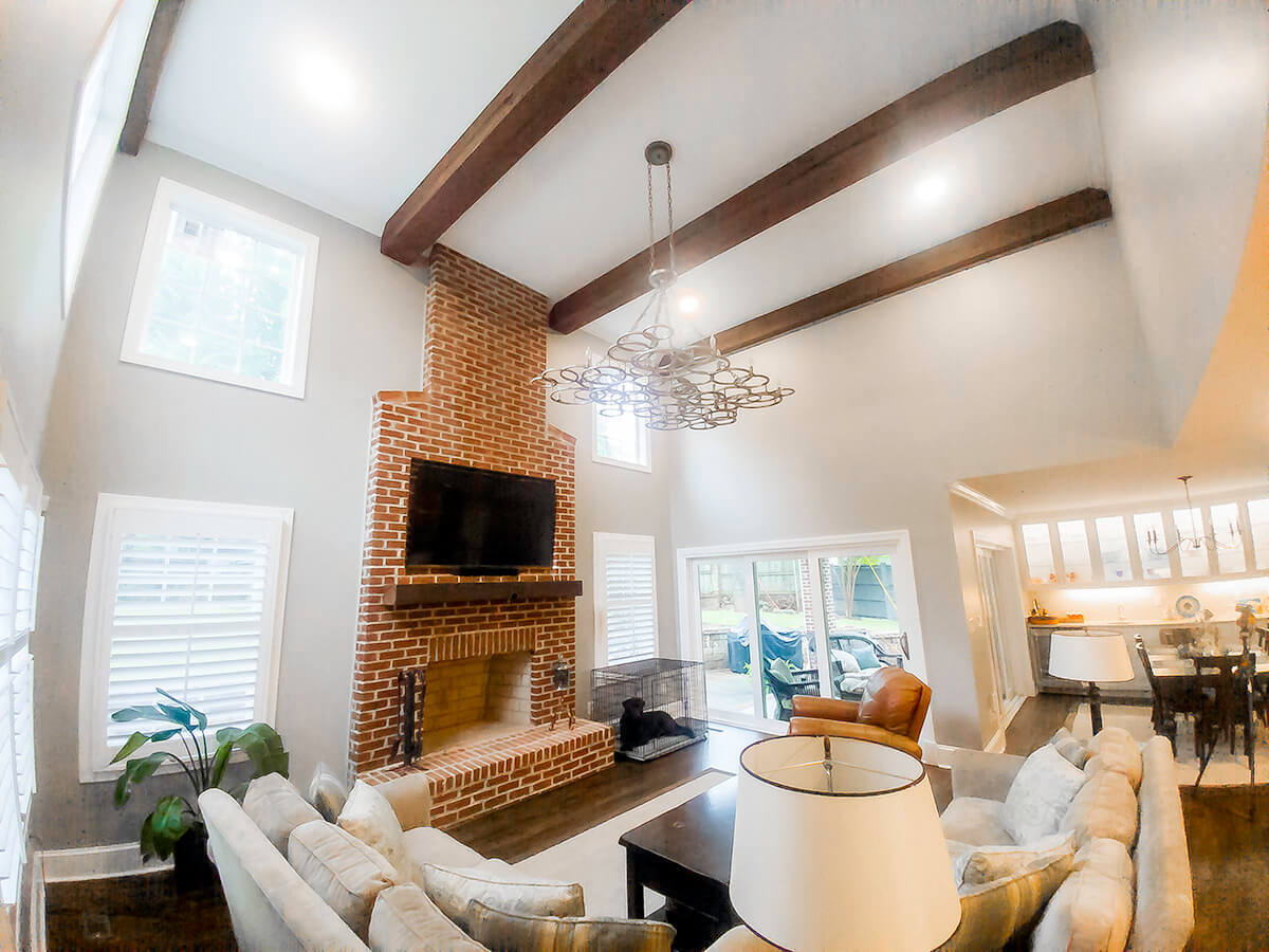 reclaimed Circle sawn box beams against a white ceiling