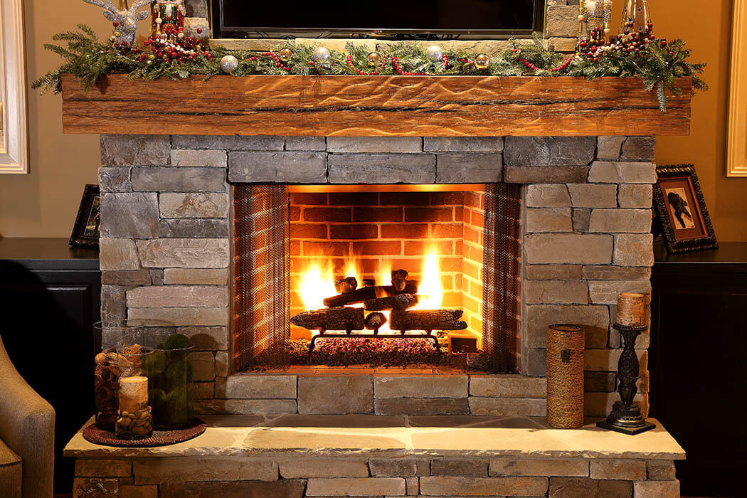 Craftsman reclaimed wood mantel above fireplace in Greenville South Carolina.