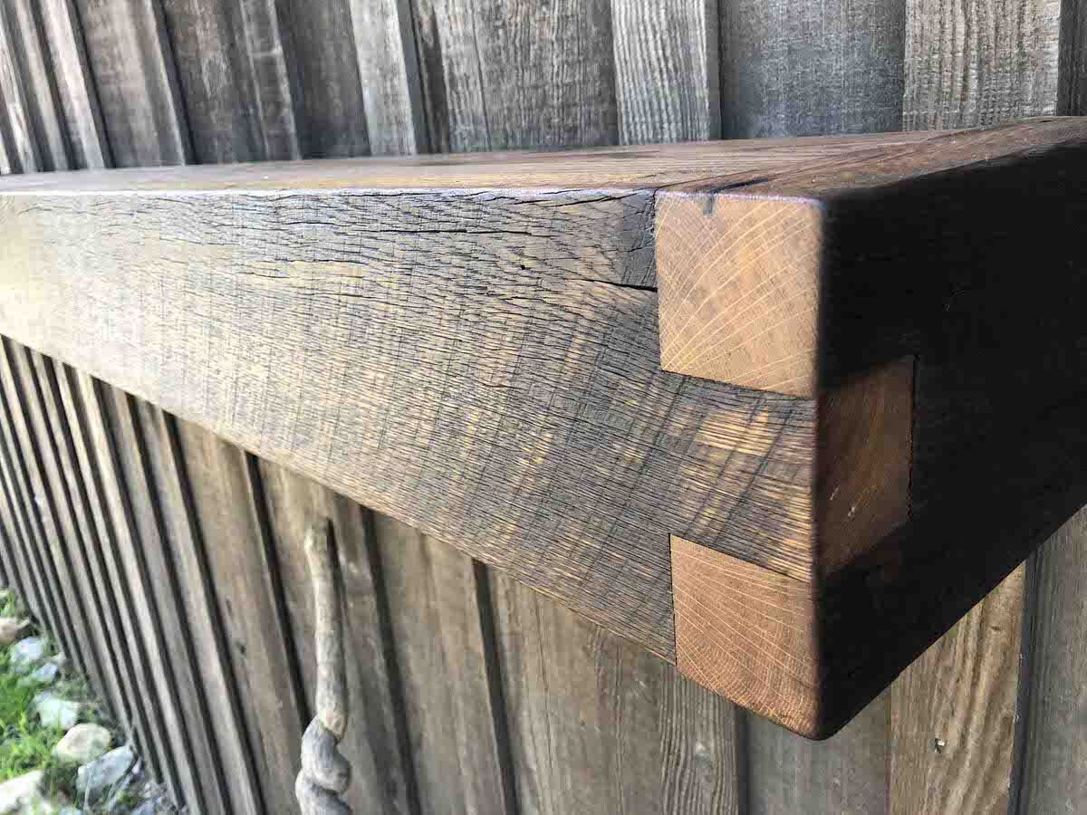 oak box mantel with finger joints corners here displayed on an exterior wall