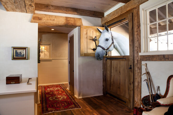 Hand hewn beams and a horse at the Equestrian Center Tryon NC