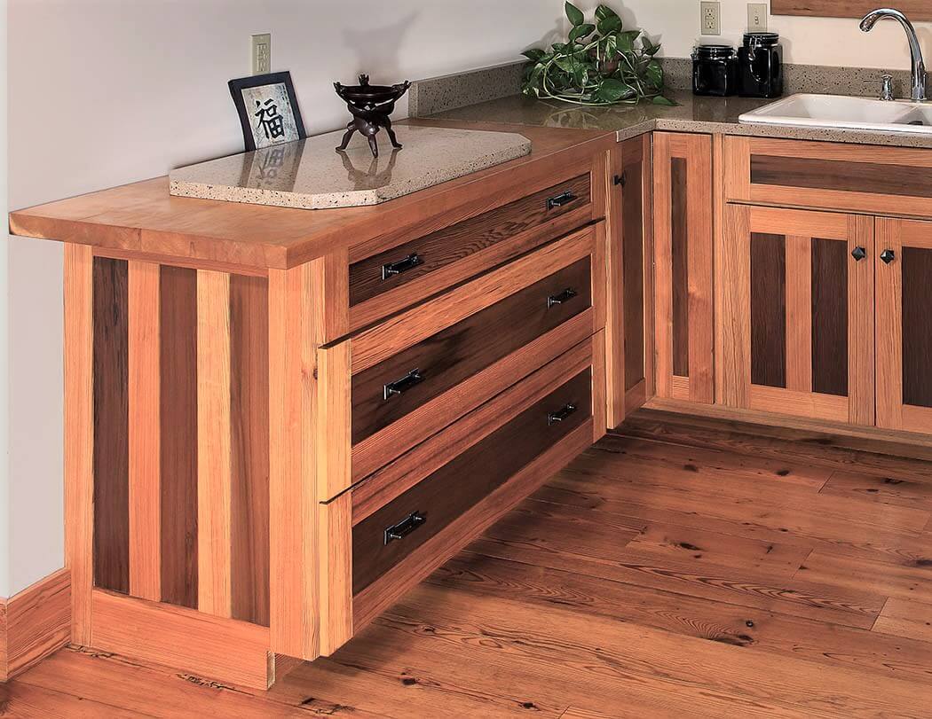 antique heart pine and redwood contrasts in cabinet panels in zirconia, nc kitchen