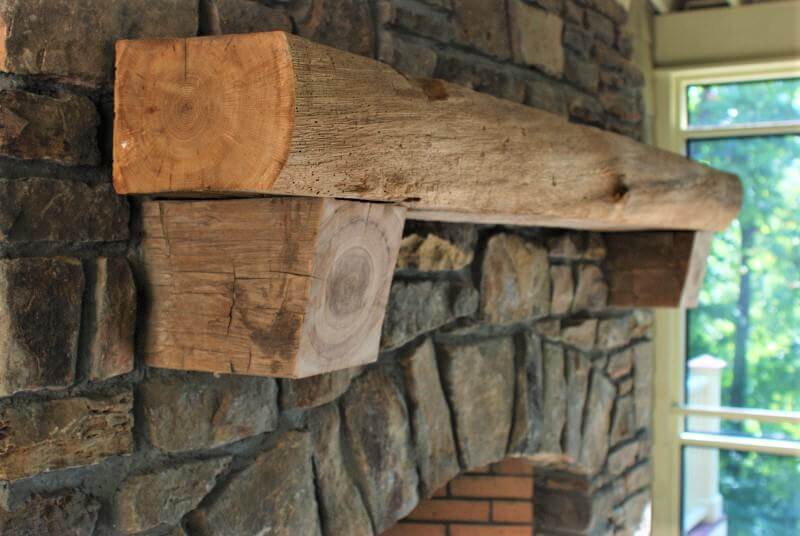 live edge fireplace mantel with cross grain corbels