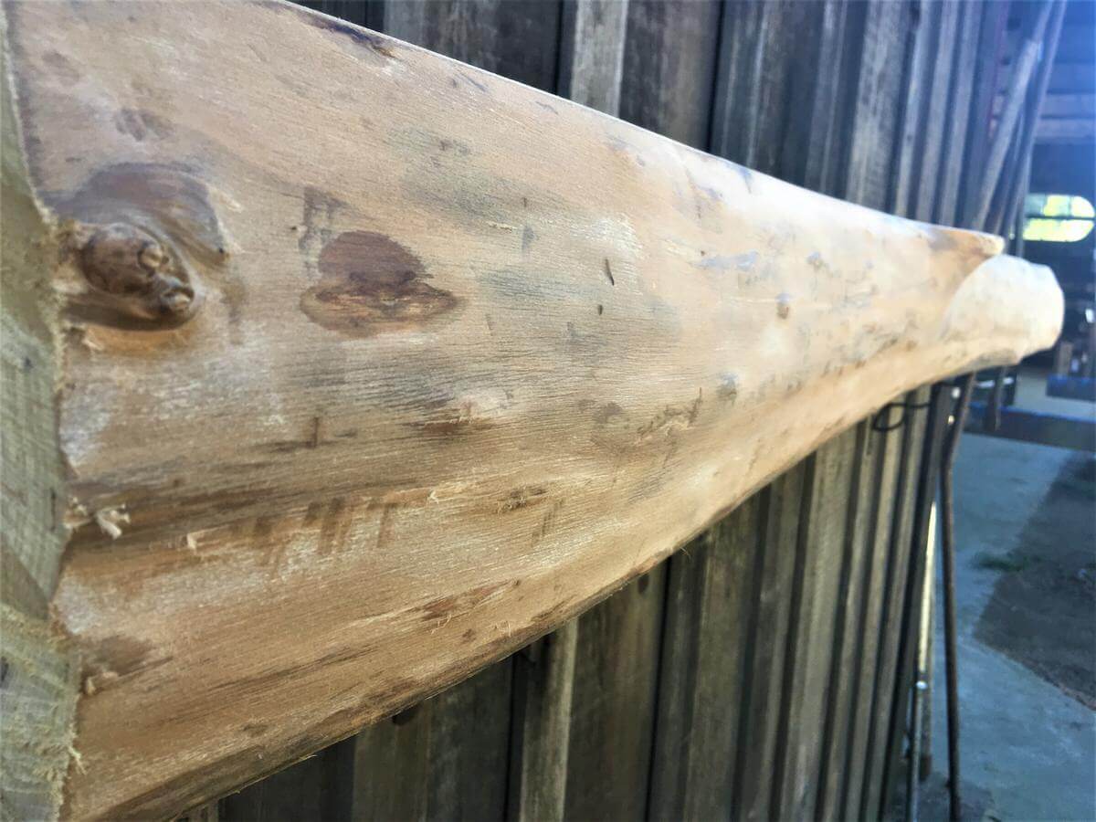 Live edge rustic mantel made from elm.