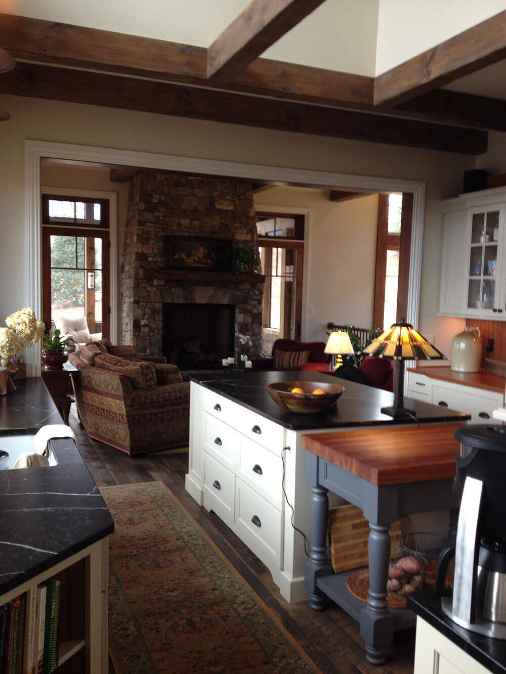 Reclaimed beams under a kitchen skylight in Black Mountain