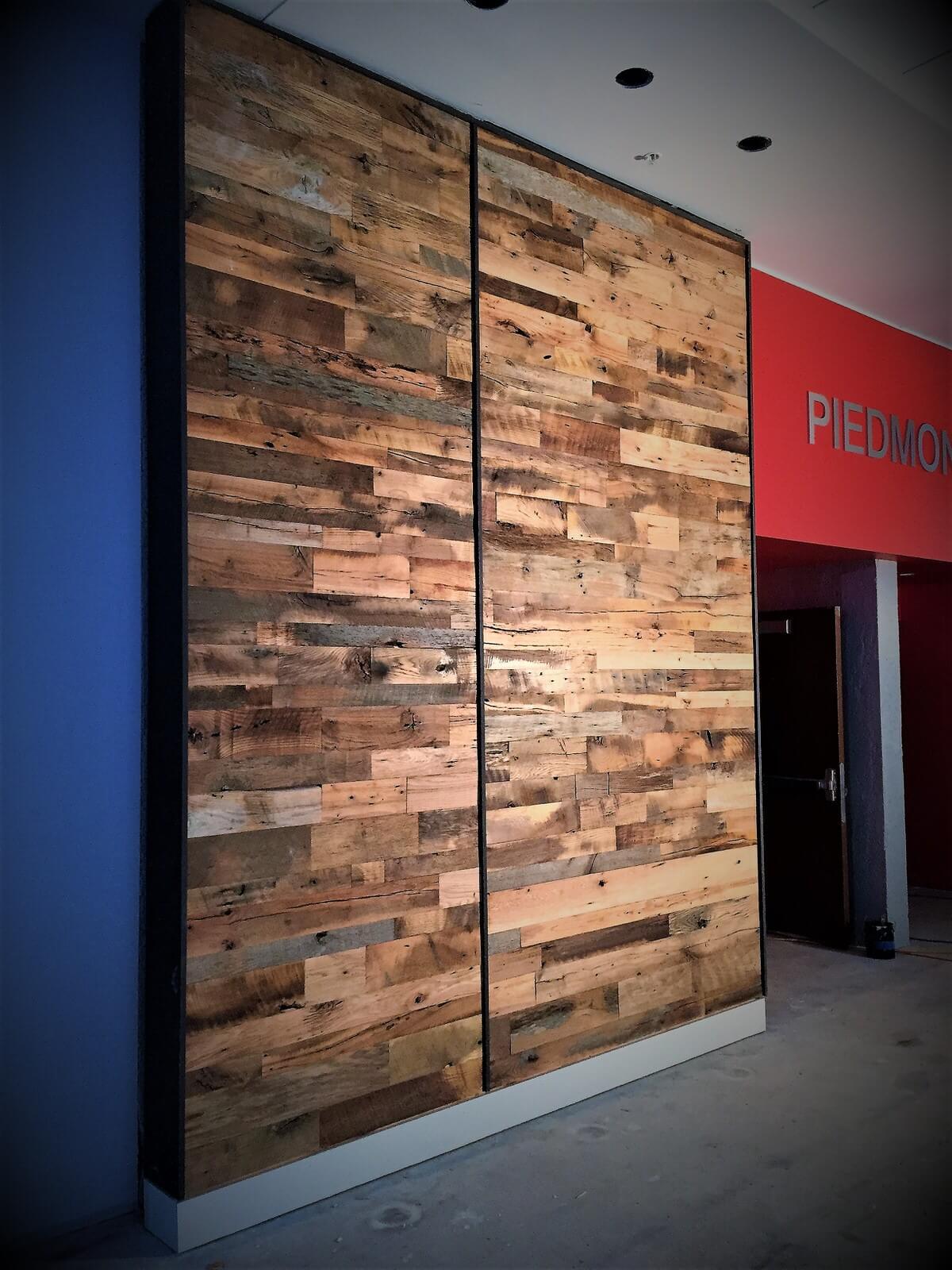 Reclaimed hardwood accent wall at the Bayer Bldg in raleigh, nc