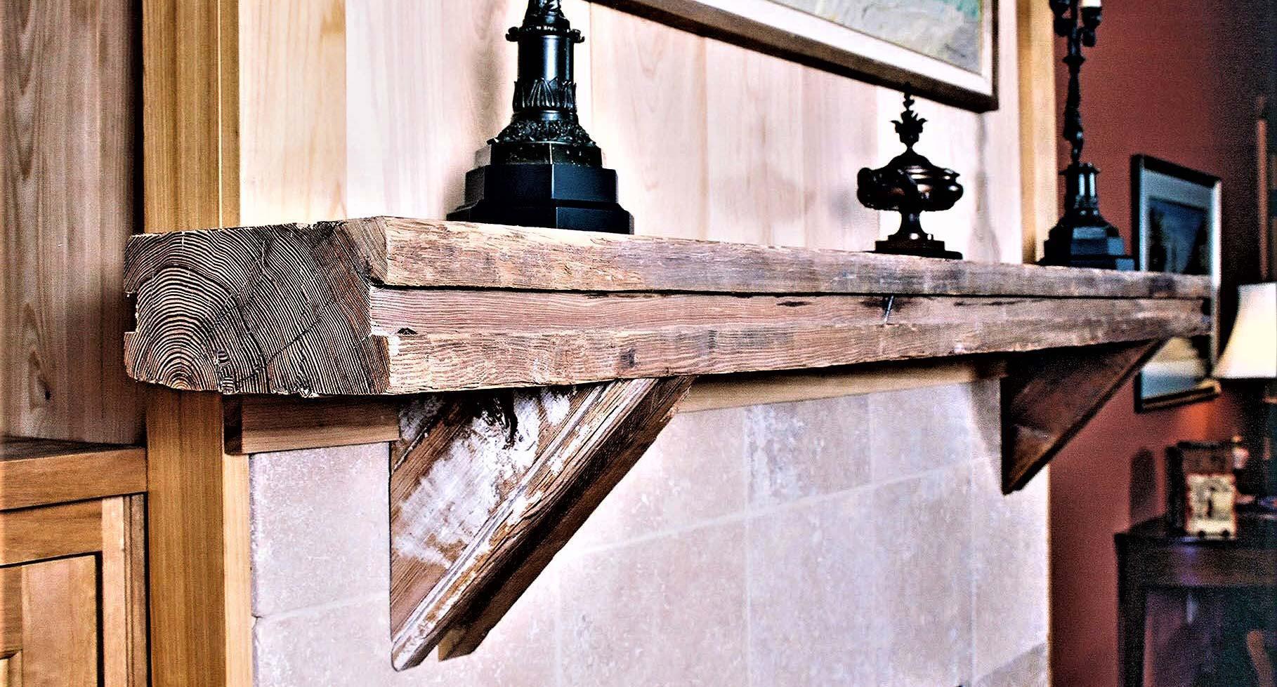 Reclaimed Heart Pine wood mantel above fireplace provides rustic ambiance.