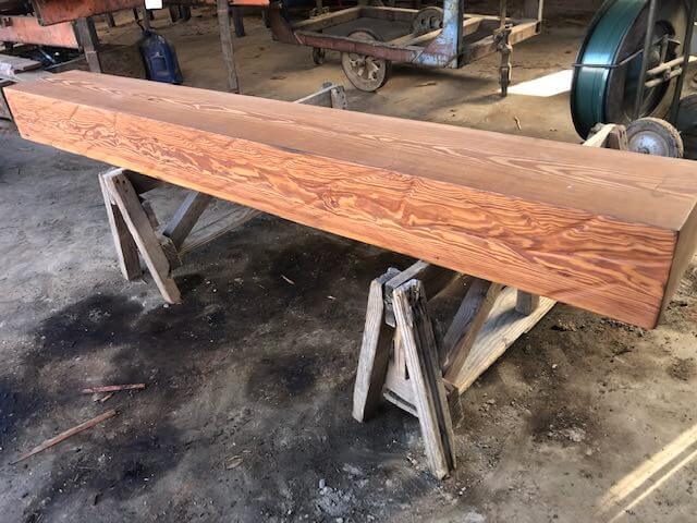 heart pine rippled mantel on sawhorses