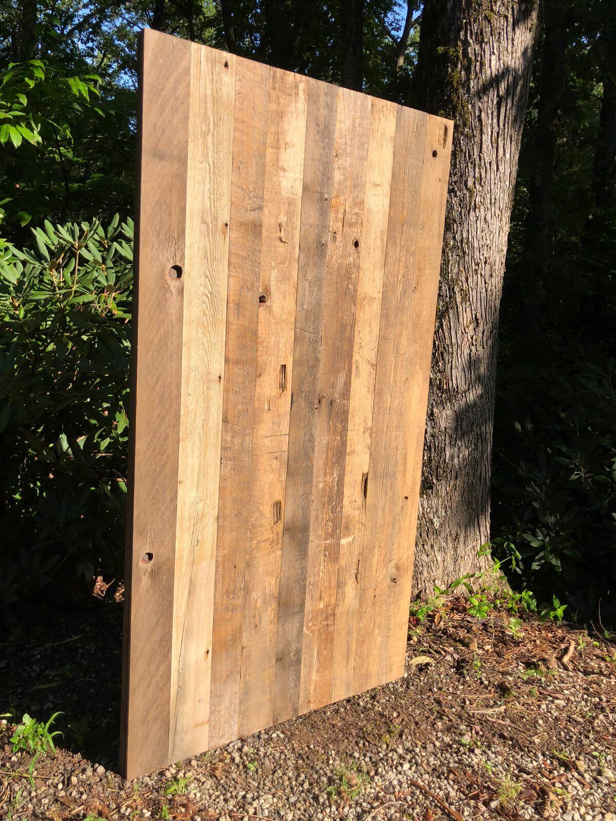 rustic distressed simple design barn door set up outside for the photo